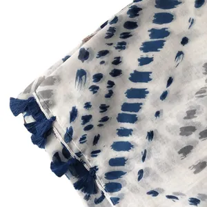 Écharpe en coton à pois avec glands bleus et texture douce pour femmes