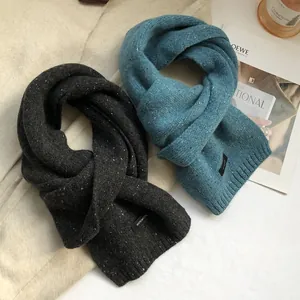100% wool knitted scarf set in dark grey and blue-green with warm snowflake texture