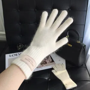 Weiße Strickhandschuhe aus 100 % australischer Wolle für Damen mit flauschiger Textur
