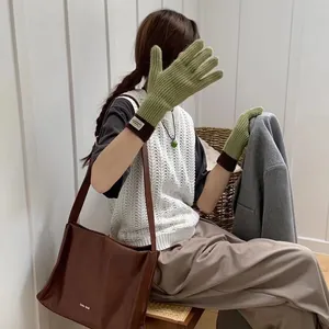 Green and brown color block knit gloves with touch screen design and wrist label