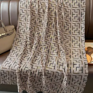 Winter cotton linen scarf with golden geometric pattern and elegant fringe details