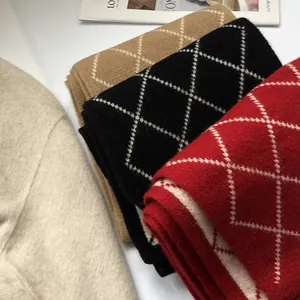 Classic diamond pattern 100% wool scarves in camel, black, and red for winter warmth