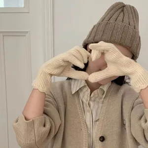 Winter set with cream knit touchscreen gloves, brown ribbed hat and beige cardigan