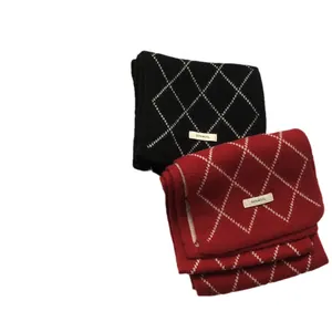 Winter 100% wool scarf featuring classic black and red diamond knit patterns