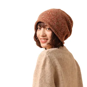 Winter chunky knit beanie hat in 100% pure wool with orange and brown flecked texture