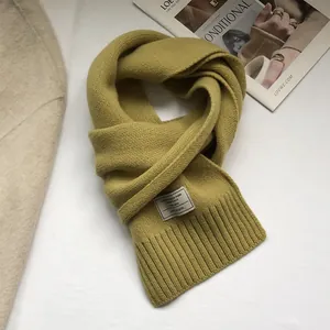 Detail of premium mustard yellow 100% Australian wool scarf with rib-knit edge