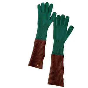 Winter knitted touchscreen gloves in solid green and brown color blocking with gold button