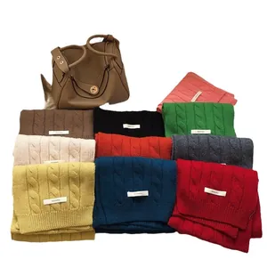 100% Wool knitted scarves in multiple colors featuring thick cable patterns for winter