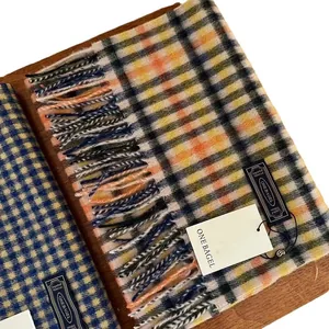 Classic plaid wool scarf with tassels for winter fashion featuring soft fringed edges