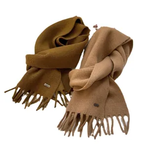 100% Wool knitted scarves in olive green and camel beige with tassel fringe edges