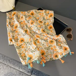 Breathable floral cotton-feel scarf with tassels and elegant orange flower patterns