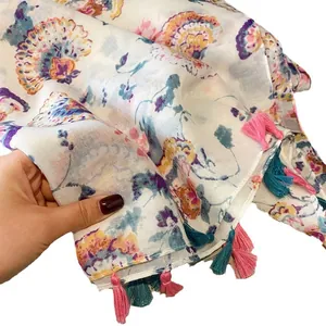Écharpe florale bohème avec imprimés colorés et franges à pompons en coton et lin léger