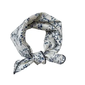 Floral cotton linen square scarf in off-white with navy blue crocheted edges