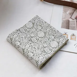 Floral print cotton bandanna hair tie and folding pouch in retro green pattern