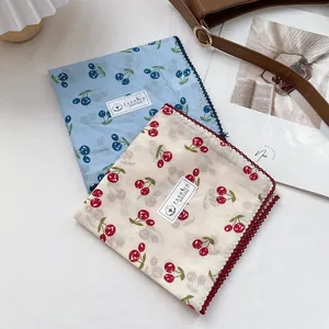 Elegant cherry print cotton square scarf set with crochet lace edges and a soft texture