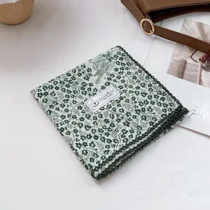 Floral cotton square scarf with bird print and green lace trim in a vintage style