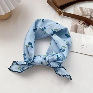 Light blue cotton linen square scarf with cherry print and blue crochet lace edge