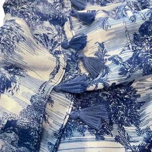 Blue and white landscape print scarf with tassels in elegant Toile de Jouy style