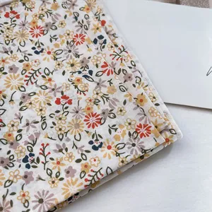 Floral silk scarf for women with small flower patterns and soft textile texture