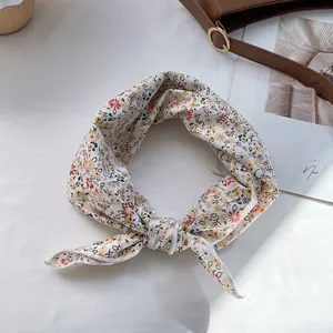 Floral silk scarf for women in cream white with colorful small flower patterns