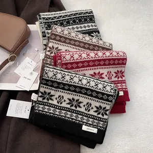 Fair Isle 100% wool jacquard scarf with snowflake patterns in black, brown, and red