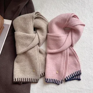 Pink and beige wool blend scarves with contrast stripes and gold button details