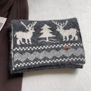 Winter knitted wool scarf with festive reindeer jacquard pattern in dark grey and white