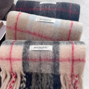 Thick wool blend plaid tassel scarves in various colors for winter warmth and comfort
