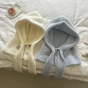 Knitted balaclava set in milk white and light blue featuring button neck and ribbed texture