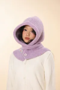 Detail of soft lavender knit balaclava featuring fluffy texture and button closure