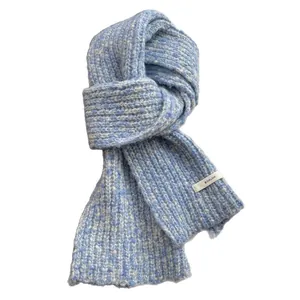 Blue and white mixed wool knit winter scarf with logo patch on a plain background