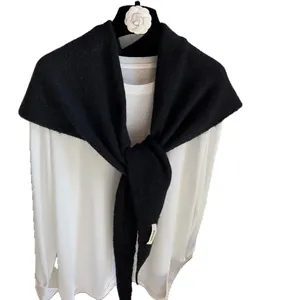 Classic black knitted shoulder wrap shawl for women styled over white shirt