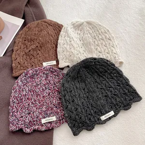 Handmade crochet wool bucket hats in four colors with 100% wool label for women