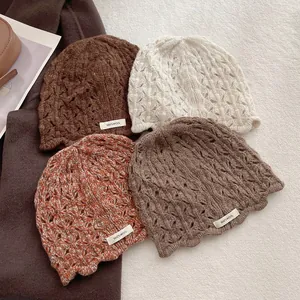Stylish 100% wool crochet bucket hats for women in assorted autumn colors with wave edge
