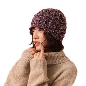 Women's handmade floral crochet wool hat with colorful honeycomb knit texture for autumn