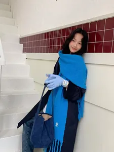 Winter set with bright blue tassel scarf, fingerless gloves and blue suede tote bag