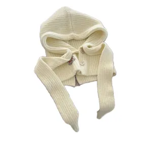 Soft cream knit balaclava hood with buttons and long shawl ties for winter warmth