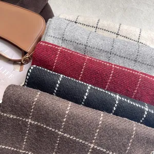 Classic plaid cashmere-feel scarf set in assorted autumn colors with fringe details