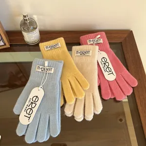 Winter long knit gloves in candy colors with touchscreen fingers and ribbed cuffs