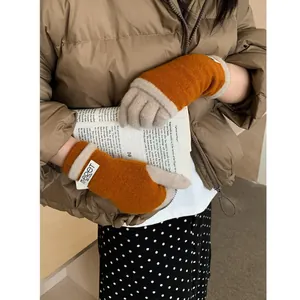 Orange and beige color-block knitted touchscreen gloves for winter warmth and style