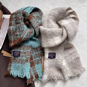 Thick soft plaid and solid scarves with fringe detail and vintage woven label