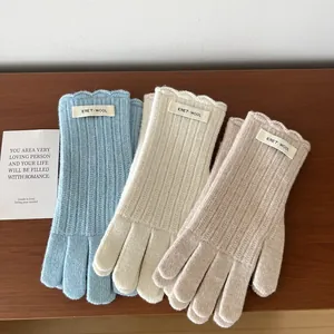 Winter 100% wool knitted gloves for women with touchscreen tips and wavy cuffs