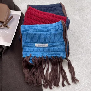 Chunky knit scarves in blue, red, and navy with long tassels and vintage Japanese style