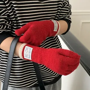 Winter chunky rib-knit gloves in vibrant red with contrasting cream wrist cuffs