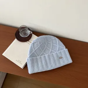 Light blue vintage Australian wool knit beanie with chic diamond pattern for women