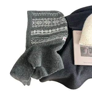 Grey Fair Isle balaclava hood with geometric patterns for winter warmth and comfort