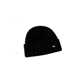 Australian wool knitted beanie with diamond pattern and fold-over cuff in black