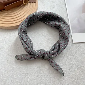 Gray geometric print neck scarf with oval patterns and premium rolled hem finish