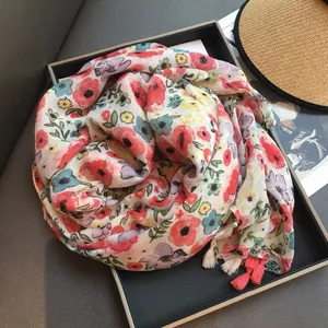 Long summer scarf with red floral print and fringe tassels in a premium gift box