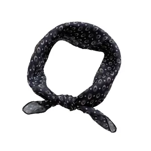 Retro geometric pattern square neck scarf in dark navy with a silky smooth texture finish